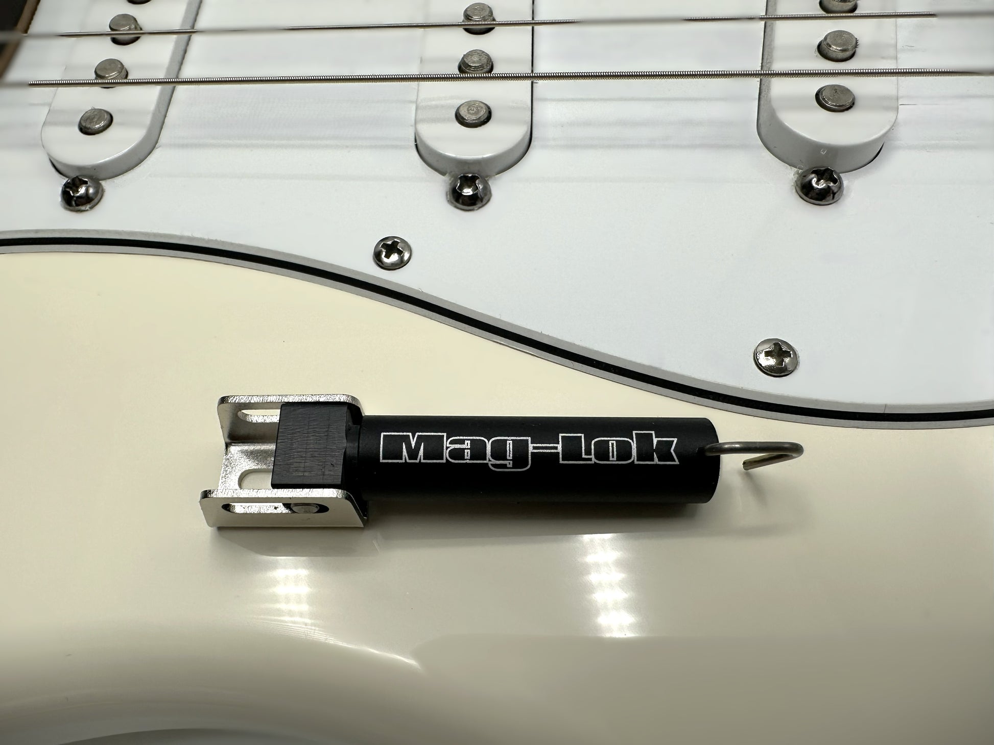 Mag-Lok device on a guitar neck